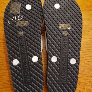 Micheal Kors flip flops